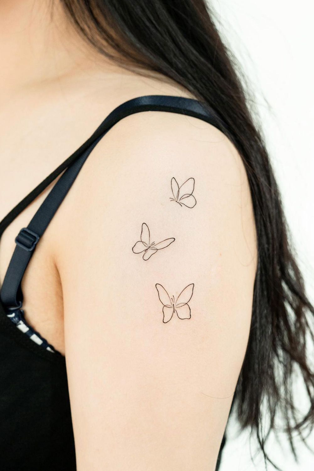 tatuajes de mariposas silueta
