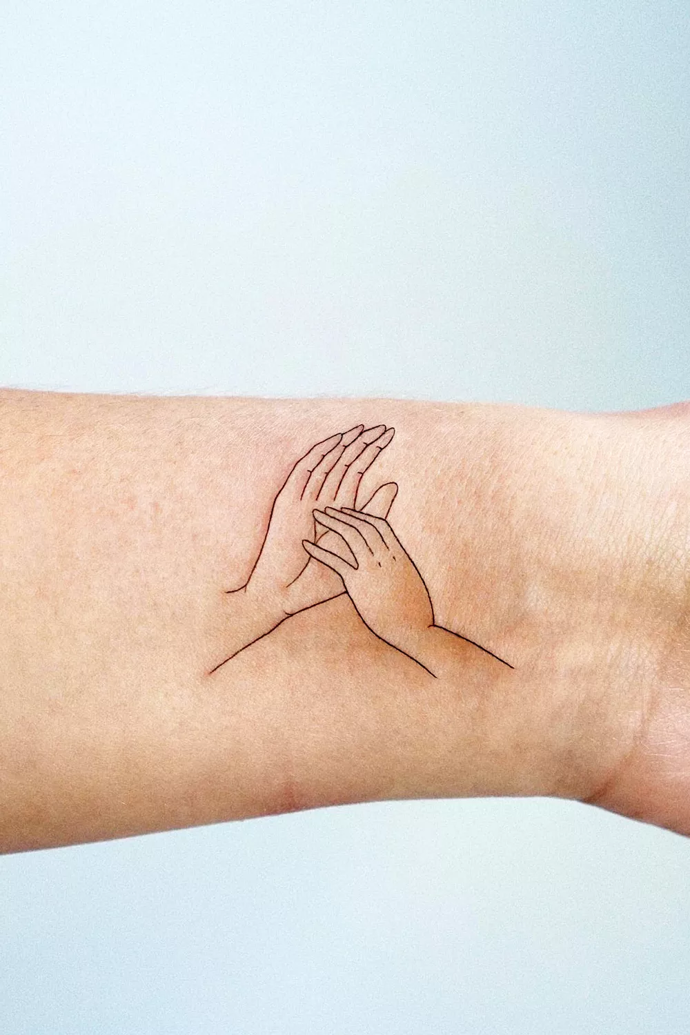 tatuaje silueta manos