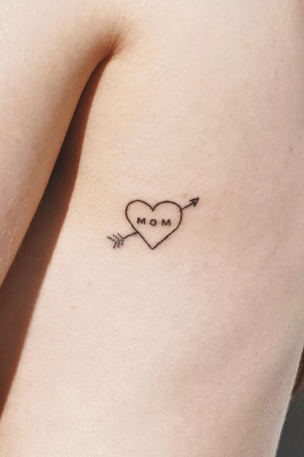 tatuajes de corazones con iniciales