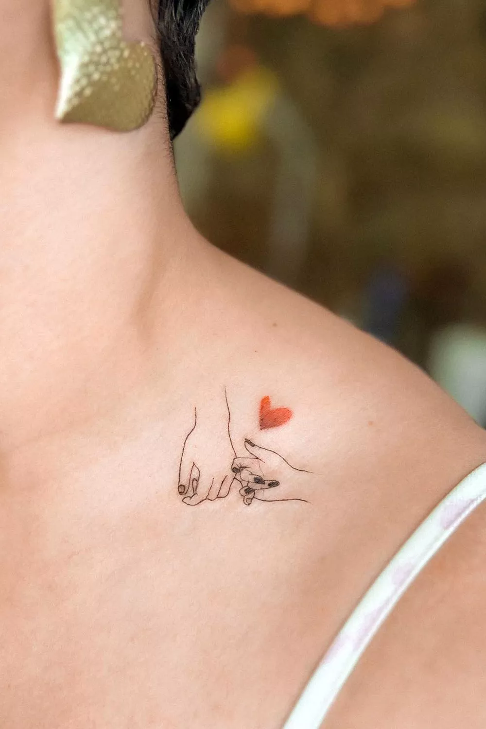 tatuajes manos unidas madre e hija