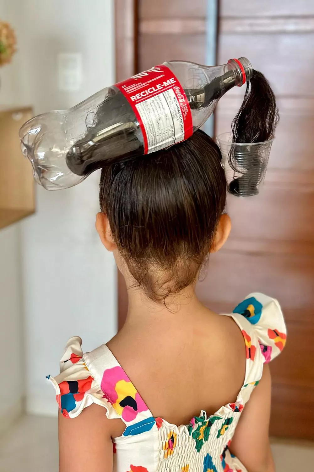 peinado botella de refresco